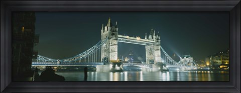 Framed Low angle view of a bridge lit up at night, Tower Bridge, London, England Print