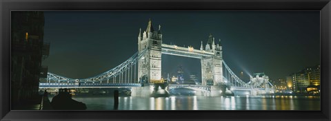 Framed Low angle view of a bridge lit up at night, Tower Bridge, London, England Print