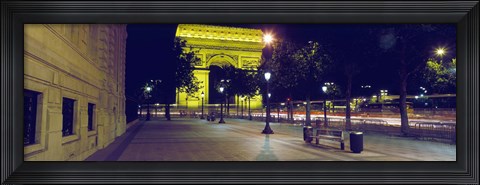 Framed France, Paris, Arc de Triomphe lit up at night Print