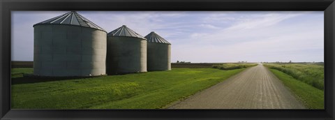 Framed Three silos in a field Print