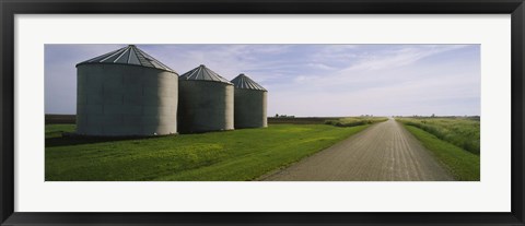 Framed Three silos in a field Print