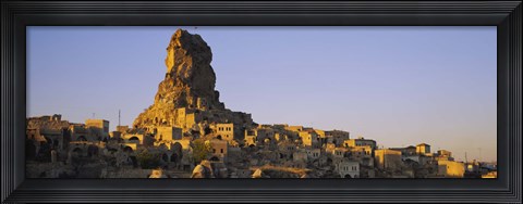 Framed Low angle view of a rock formation in a village, Cappadocia, Turkey Print