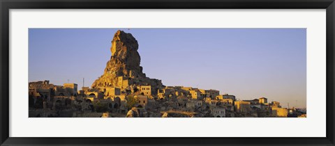 Framed Low angle view of a rock formation in a village, Cappadocia, Turkey Print