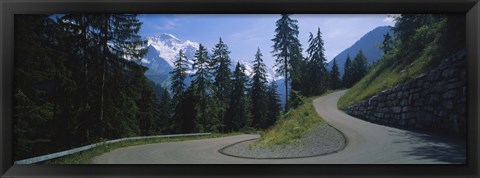 Framed Empty road passing through mountains, Bernese Oberland, Switzerland Print