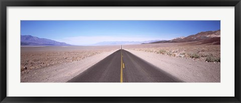 Framed USA, California, Death Valley, Empty highway in the valley Print