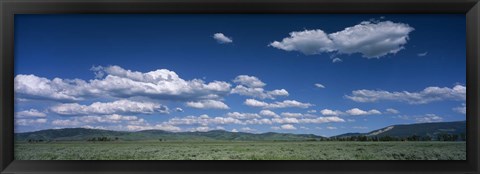 Framed Clouds and meadow, Wyoming, USA Print