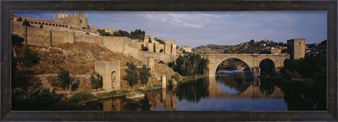 Framed Castle at the waterfront, Puente de San Martin, Tajo River, Toledo, Spain Print