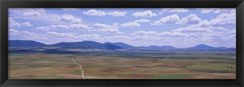 Framed High angle view of a dirt road passing through a landscape, Consuegra, La Mancha, Spain Print