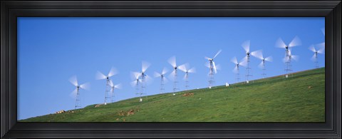Framed Low angle view of wind turbines on a hill, Altamont Pass, California, USA Print