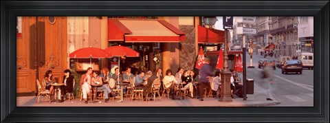 Framed Tourists at a sidewalk cafe, Paris, France Print