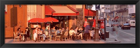 Framed Tourists at a sidewalk cafe, Paris, France Print