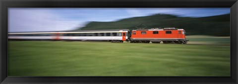 Framed Train moving on a railroad track Print