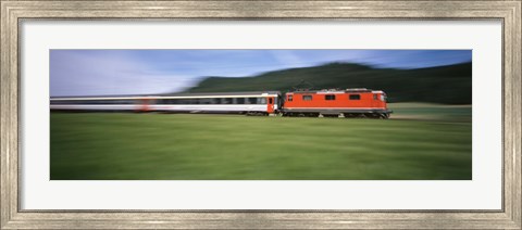 Framed Train moving on a railroad track Print