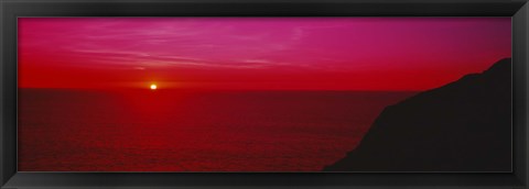 Framed Sunset over the ocean, California, USA Print
