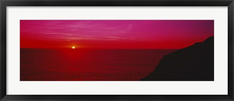 Framed Sunset over the ocean, California, USA Print