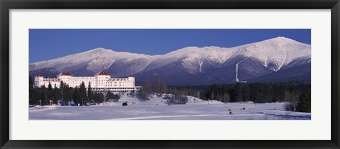 Framed Hotel near snow covered mountains, Mt. Washington Hotel Resort, Mount Washington, Bretton Woods, New Hampshire, USA Print