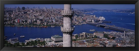 Framed Mid section view of a minaret with bridge across the bosphorus in the background, Istanbul, Turkey Print