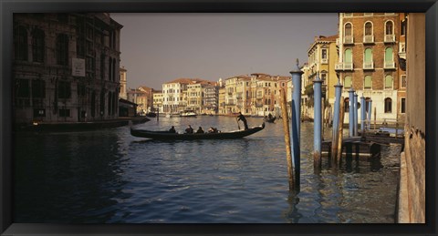 Framed Tourists sitting in a gondola, Grand Canal, Venice, Italy Print