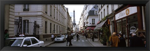 Framed Buildings along a street with a tower in the background, Rue Saint Dominique, Eiffel Tower, Paris, Ile-de-France, France Print