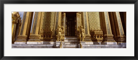 Framed Low angle view of statues in front of a temple, Phra Mondop, Grand Palace, Bangkok, Thailand Print