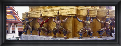 Framed Statues at base of golden chedi, The Grand Palace, Bangkok, Thailand Print
