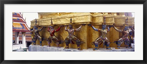 Framed Statues at base of golden chedi, The Grand Palace, Bangkok, Thailand Print