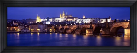 Framed Bridge across a river lit up at night, Charles Bridge, Vltava River, Prague, Czech Republic Print