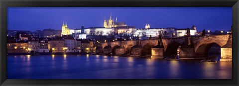 Framed Bridge across a river lit up at night, Charles Bridge, Vltava River, Prague, Czech Republic Print