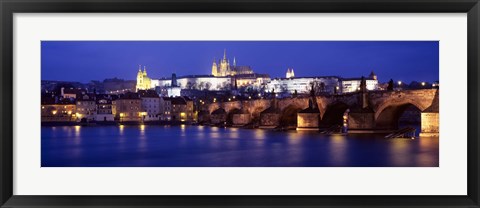 Framed Bridge across a river lit up at night, Charles Bridge, Vltava River, Prague, Czech Republic Print