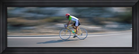 Framed Bike racer participating in a bicycle race, Sitges, Barcelona, Catalonia, Spain Print