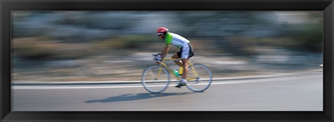 Framed Bike racer participating in a bicycle race, Sitges, Barcelona, Catalonia, Spain Print