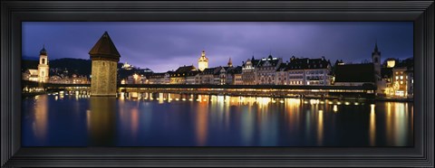 Framed Buildings lit up at dusk, Chapel Bridge, Reuss River, Lucerne, Switzerland Print