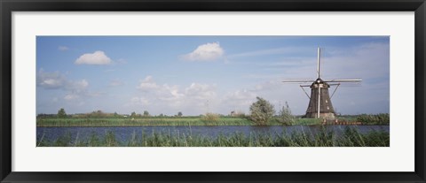 Framed Netherlands, Traditional windmill in the village Print