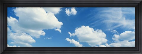 Framed Clouds against a pale blue sky Print