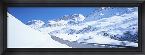 Framed Snow covered mountains on both sides of a road, St Moritz, Graubunden, Switzerland Print