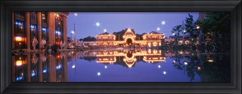 Framed Buildings in an amusement park lit up at dusk, Tivoli Gardens, Copenhagen, Denmark Print