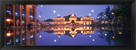 Framed Buildings in an amusement park lit up at dusk, Tivoli Gardens, Copenhagen, Denmark Print