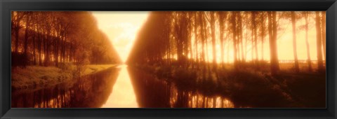 Framed Belgium, tree lined waterway through countryside, sepia tone Print