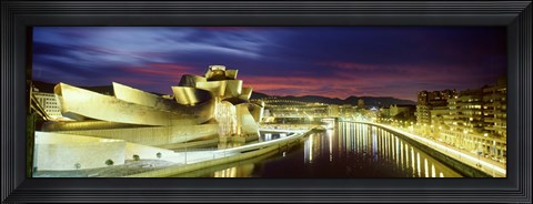 Framed Buildings lit up at dusk, Guggenheim Museum Bilbao, Bilbao, Vizcaya, Spain Print