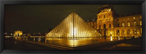 Framed Museum lit up at night, Musee Du Louvre, Paris, France Print