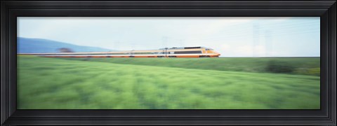 Framed TGV High-speed Train passing through a grassland Print