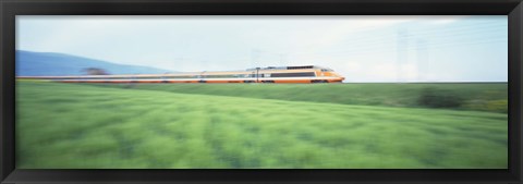 Framed TGV High-speed Train passing through a grassland Print