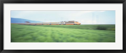Framed TGV High-speed Train passing through a grassland Print