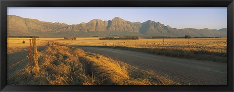 Framed Road running through a farm, South Africa Print