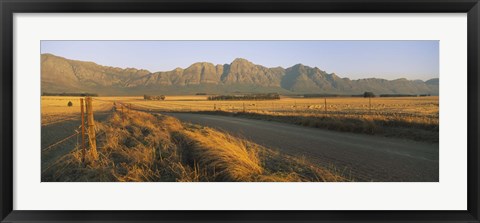 Framed Road running through a farm, South Africa Print