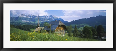 Framed Chalet and a church on a landscape, Emmental, Switzerland Print