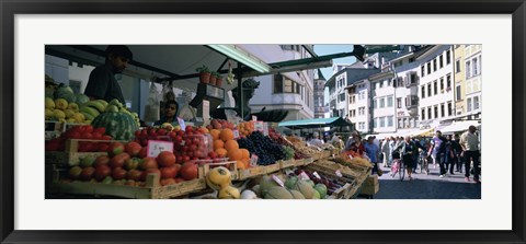 Framed Group of people in a street market, Lake Garda, Italy Print