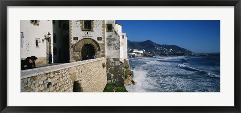 Framed Tourists in a church beside the sea, Sitges, Spain Print