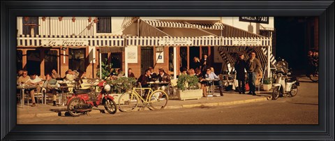 Framed Tourists sitting in a cafe, Sitges Beach, Catalonia, Spain Print