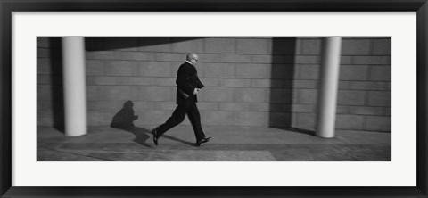 Framed Side Profile Of A Businessman Running With A Briefcase, Germany Print